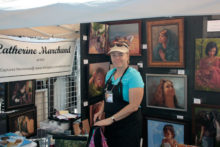 Artist Catherine Marchard at Art Walk. She sells cards, prints and canvas reproductions