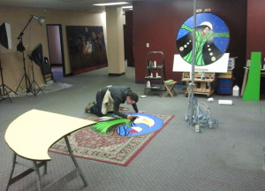 Aaron working on the Grandin Station Mural in the Artstream space